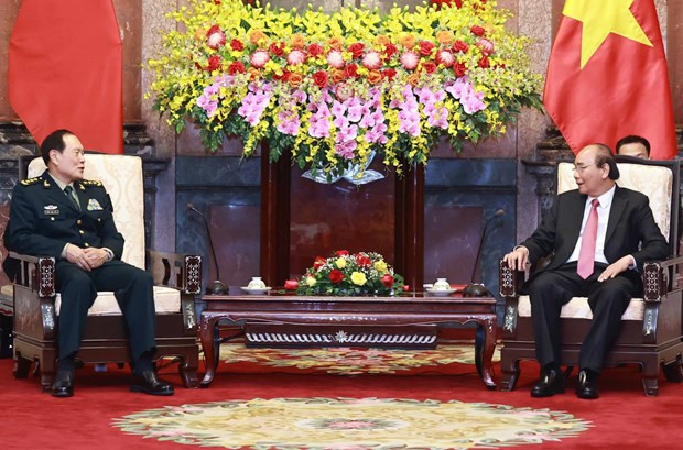 Armies’ successful ties help reinforce Vietnam-China relations: President